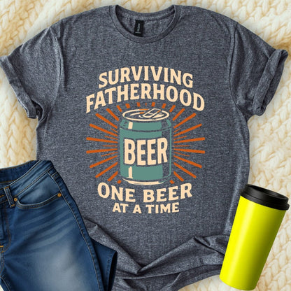 MyDesigns Physical Item Surviving Fatherhood One Beer At A Time T-Shirt